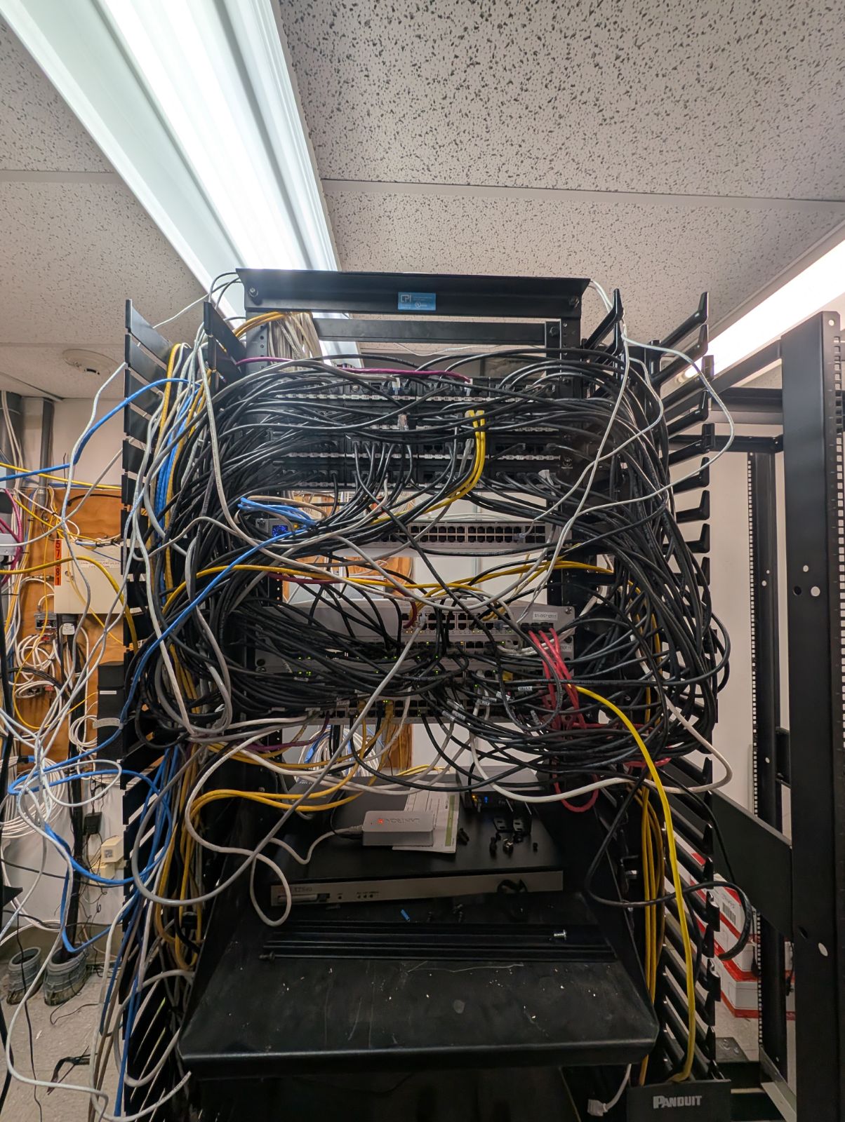 Before — messy network wiring